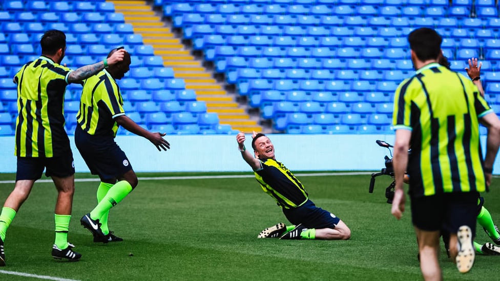 ICONIC : Paul Dickov provides a re-run of his Wembley knee slide.