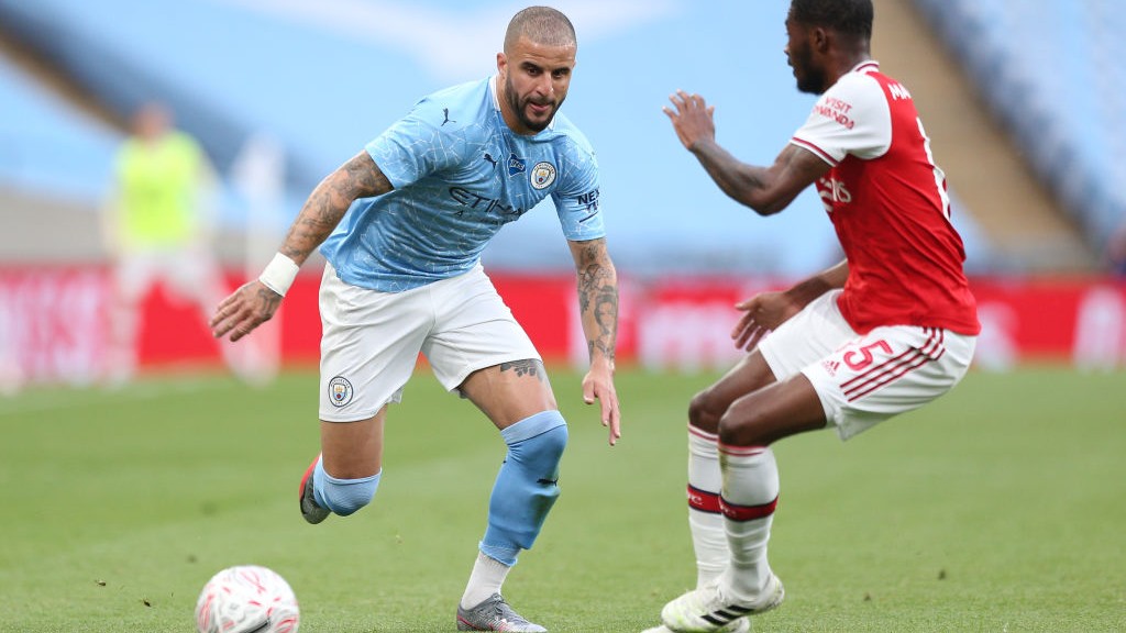 SPEED WALKER: Kyle Walker shows Ainsley Maitland-Niles a clean pair of heels