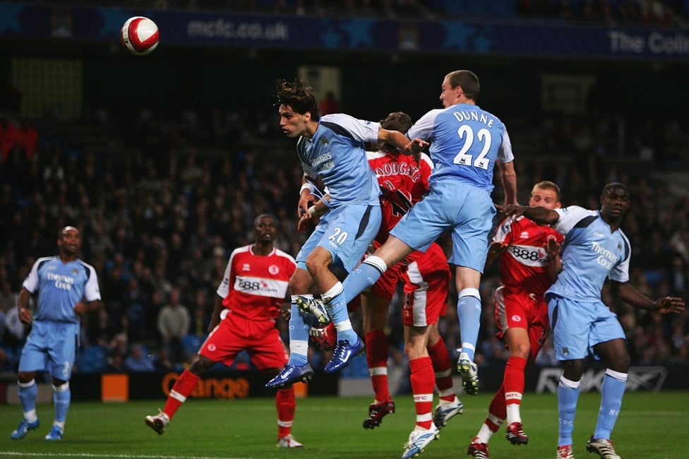 Climbing high : Dunne nods home the winner against Middlesbrough in 2006