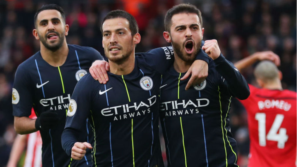 STARS ON SUNDAY: David Silva celebrates his early goal with Bernardo