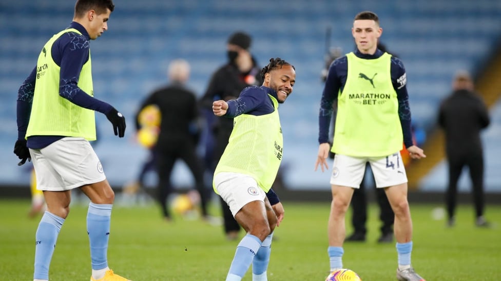 ALL SMILES : Sterling chuckles as he wins the ball back from the rondo.