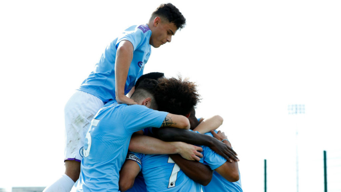 GET IN: City U18s celebrate against Liverpool.