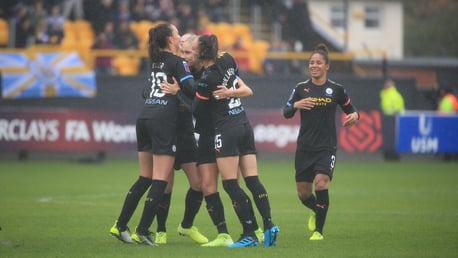 GROUP HUG: Steph Houghton is mobbed after her match winning goal.