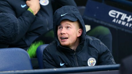 KEV IN THE HOOD: Kevin De Bruyne is wrapped up against the bitter December elements