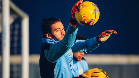 HIGH AND MIGHTY: Ederson leaps to keep out this goalbound effort