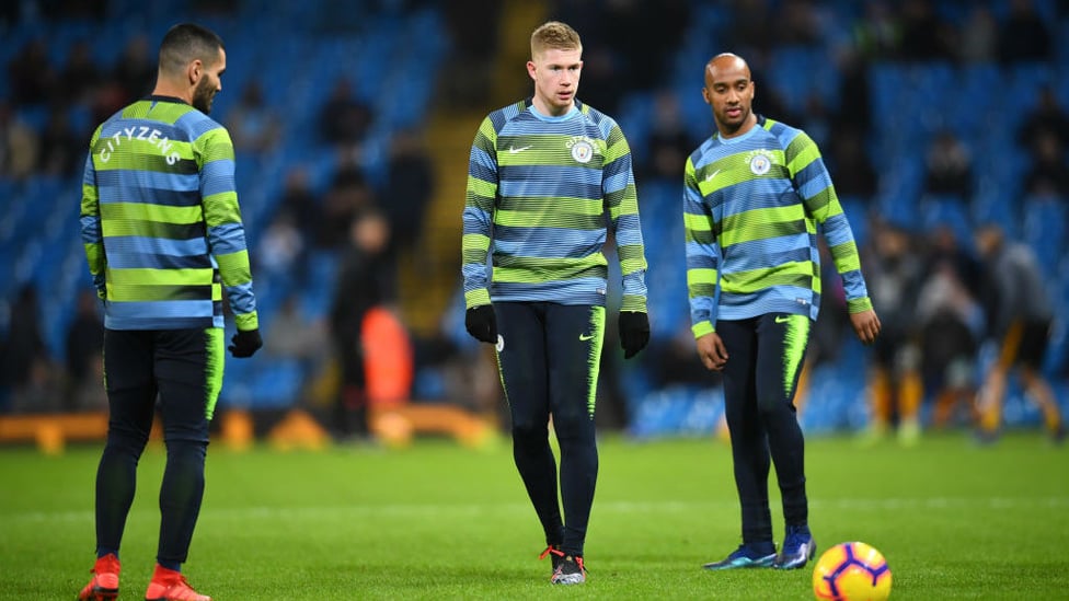 EYES ON THE PRIZE : Delph, Gundogan and De Bruyne warm up ahead of Wolves clash