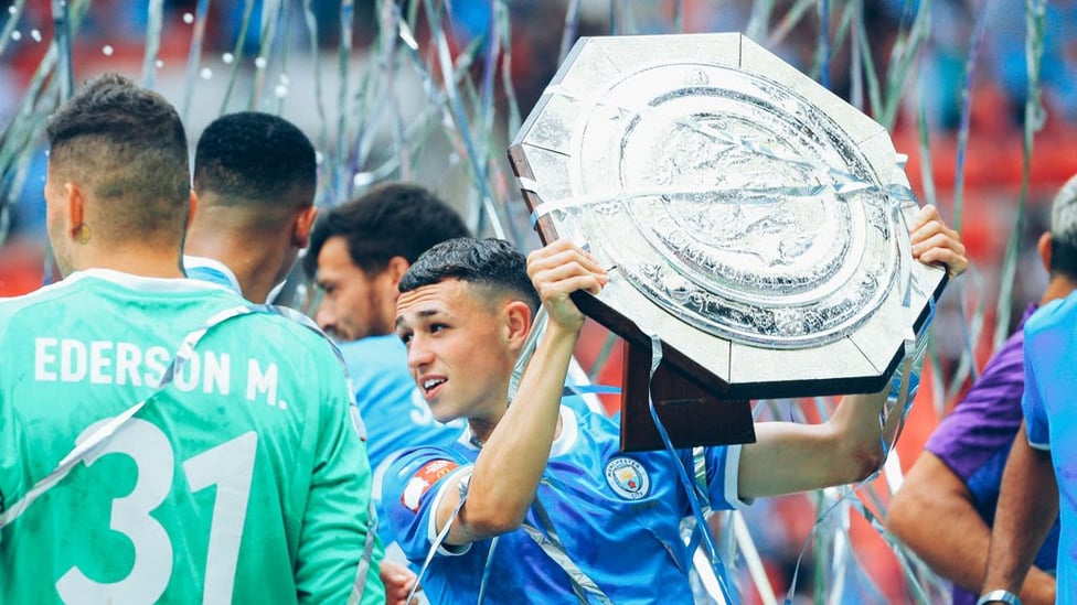 WINNER : Foden with the seventh trophy of his club career and all before the age of 20!