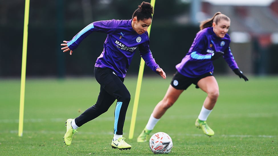 DRIVING DEMI : Demi Stokes races forward with possession