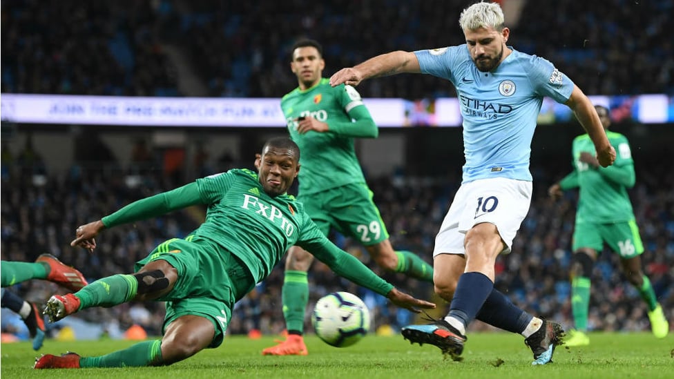 LAST GASP : Christian Kabasele slides in to block Sergio's power shot