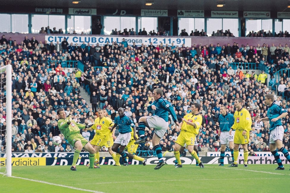 Goal! : Dunne prods home against Birmingham in September 2001