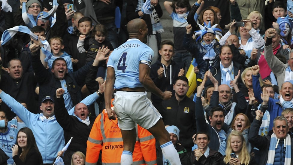 SQUAD LEADER : Kompany scores to help secure the Premier League title in 2014
