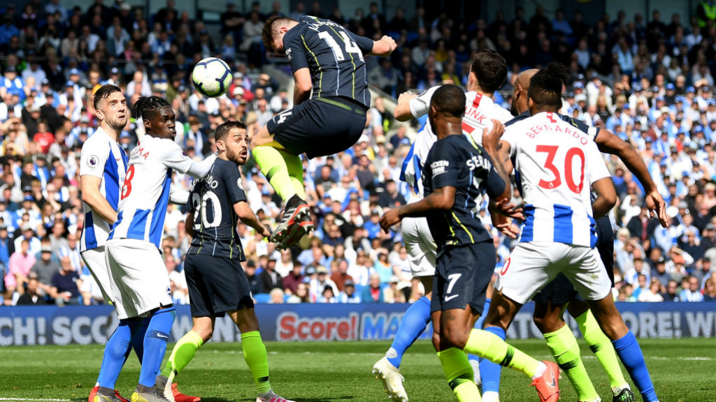 HIGH JUMP : Aymeric Laporte rises highest to give City a 37th minute lead.