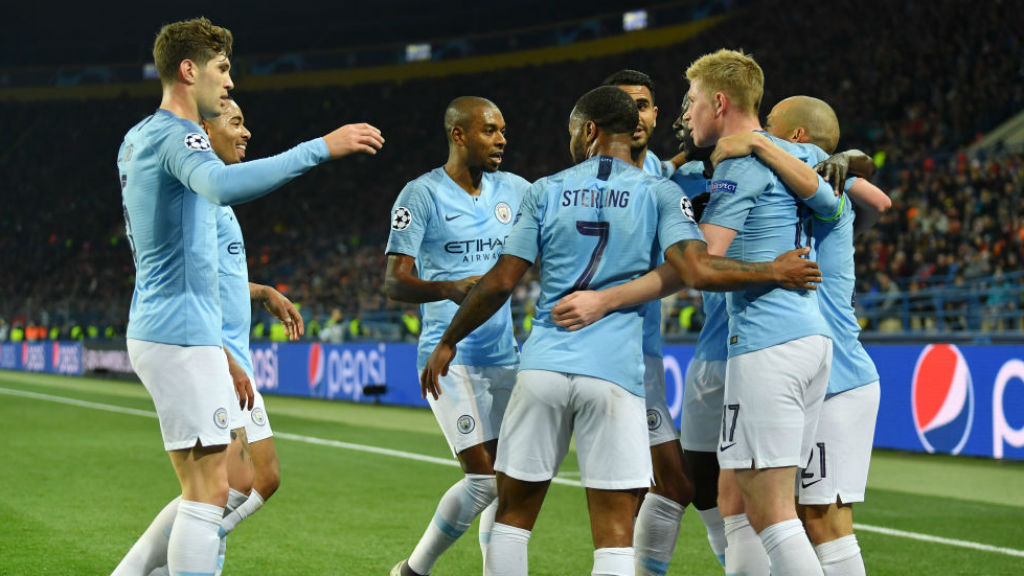 CELEBRATION TIME: The City players salute David Silva after the skipper's brilliant strike