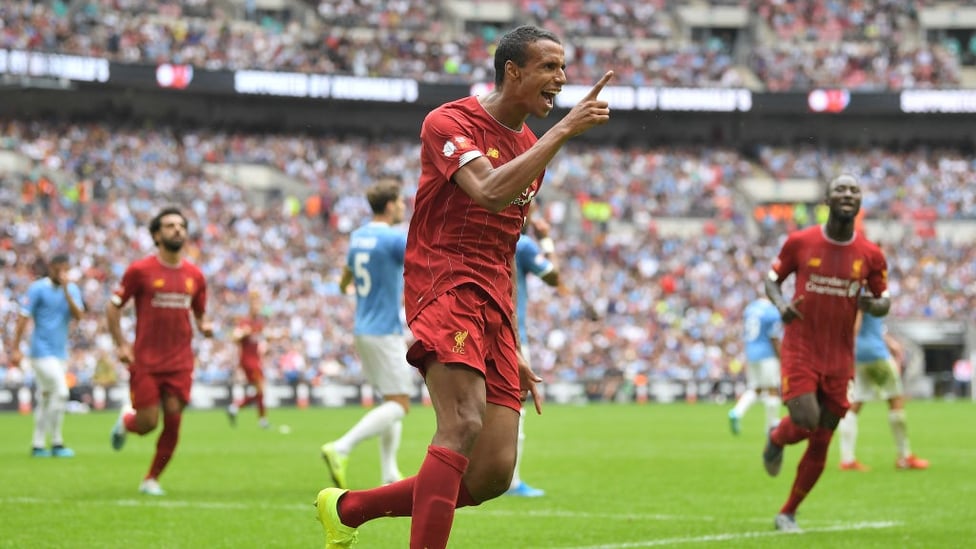LEVELLER : Joel Matip heads home for Liverpool on 76 minutes.