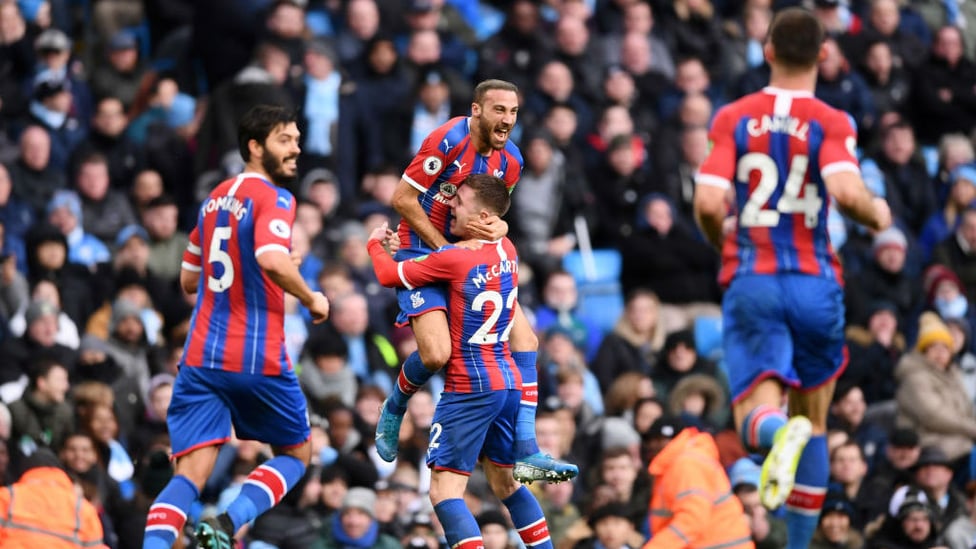 OPENER : Tosun celebrates after nodding the visitors into a shock lead.