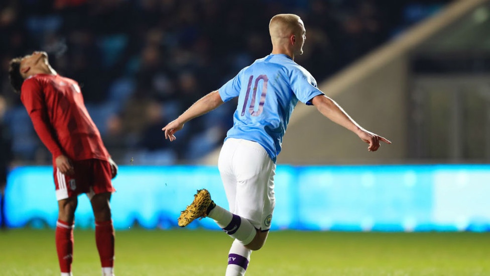TARGET MAN : Lewis Fiorini wheels away in delight after his early goal