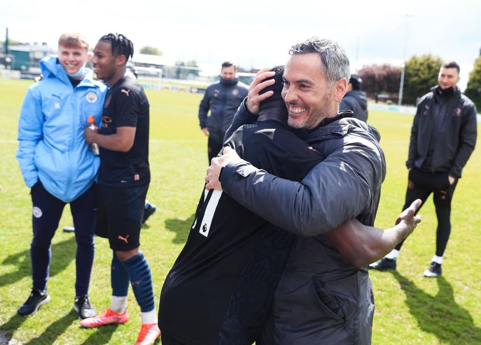 LEADING MAN: Head coach Carlose Vicens celebrates with goal scorer Carlos Borges