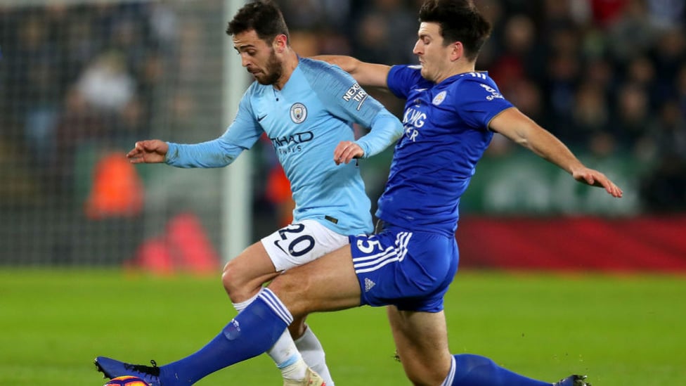 SHADOW PLAY : Bernardo Silva looks to shake off Harry Maguire