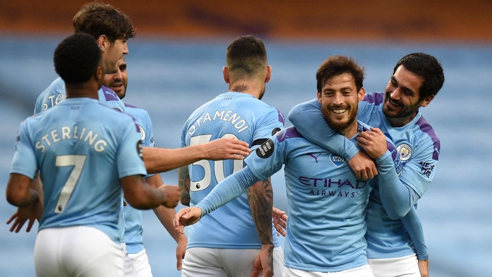 CAPTAIN FANTASTIC : El Mago is congratulated after his wonderful goal.