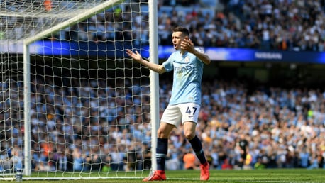 GOALDEN VISION: Phil Foden starts the celebrations after heading City into an early lead