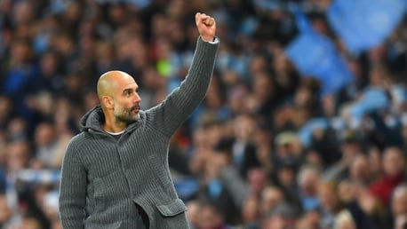 SALUTES: Pep Guardiola acknowledges the Etihad Stadium crowd.