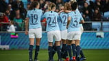 CELEBRATE: The squad after Georgia Stanway's goal.