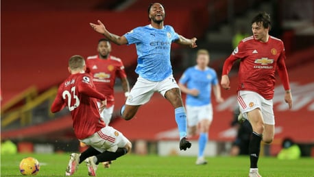 FRUSTRATION: As Luke Shaw nicks the ball off Raheem Sterling