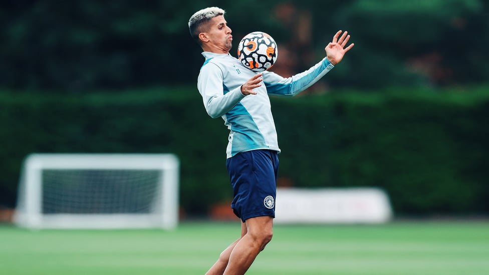 CHEST CONTROL: Joao Cancelo brings down an aerial ball