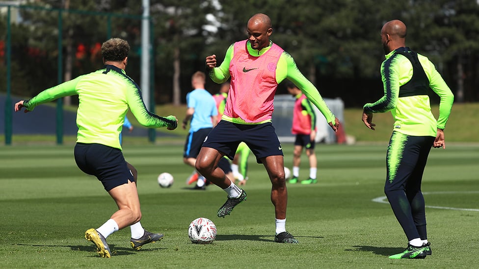 BALL BOYS : Vincent Kompany and Kyle Walker vie for possession