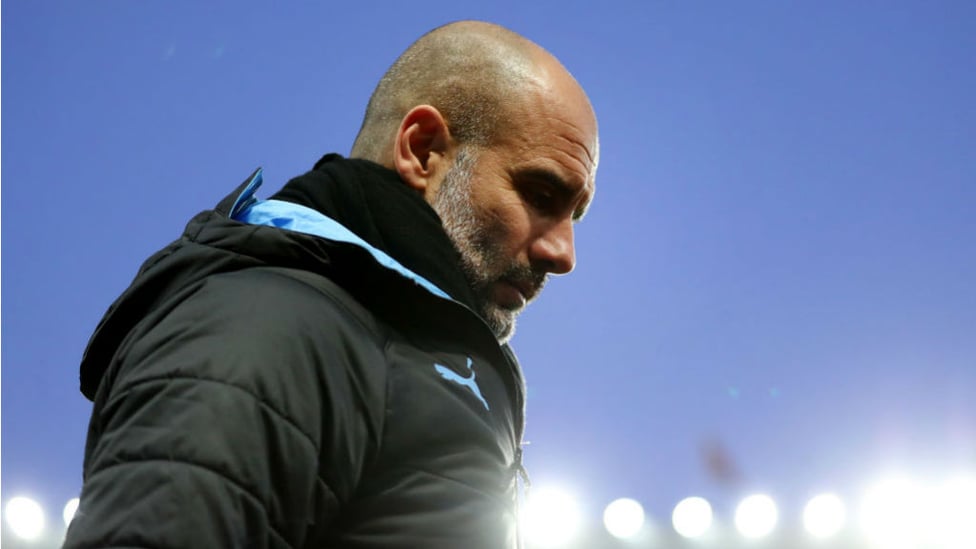 ALL LIT UP : The boss makes his way to the dugout prior to kick-off at Villa Park