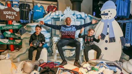 SANTA'S GROTTO: Vincent Kompany surprised two worthy young Blues and gave them some festive cheer