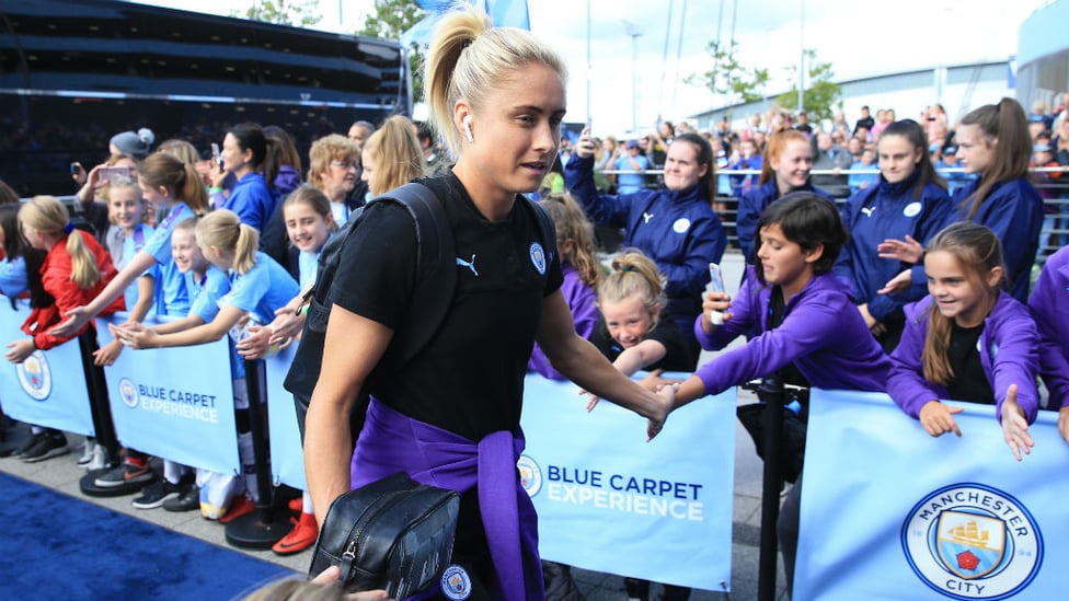 LEADING ROLE : Skipper Steph Houghton is given a rousing reception as City arrive at the Etihad