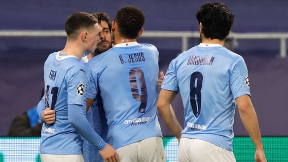 TEAM: Jesus and Foden celebrate with Bernardo after his goal.