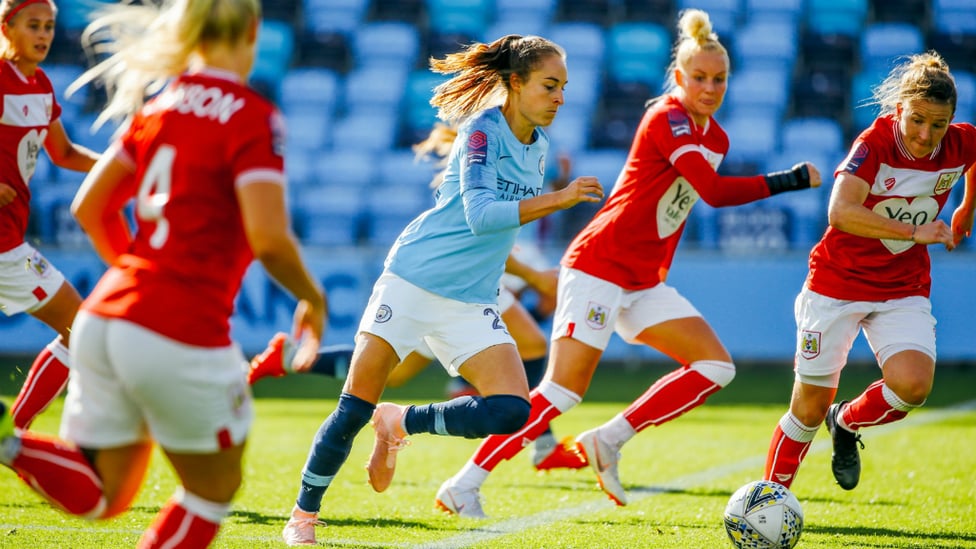 SURROUNDED : Tessa Wullaert tries to escape the attention of a packed Bristol defence