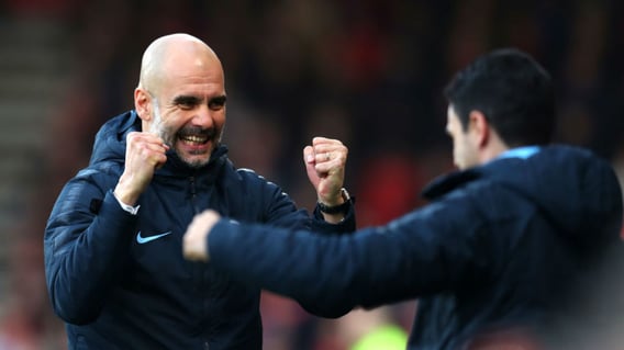 SMILES BETTER: Pep Guardiola celebrates our opener with Mikel Arteta