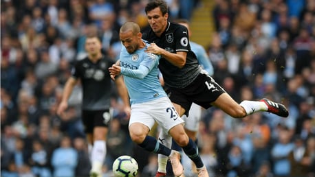 SOLID SILVA: David Silva looks to wriggle free from Burnley's Jack Crok