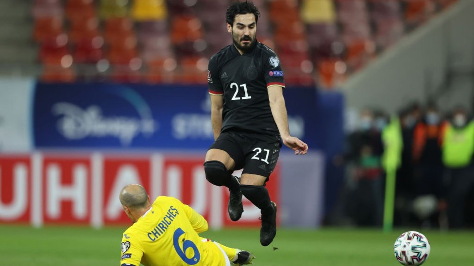 MIDDLE MARCH: Ilkay Gundogan in action for Germany away to Romania