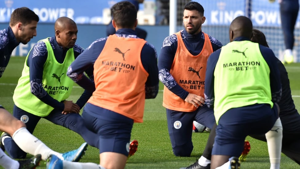 GET LOOSE : Sergio and co stretch their muscles ahead of kick off.