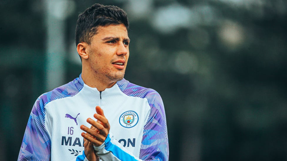 HAND IT TO RODRI : Our Spanish midfielder warms to the task in hand