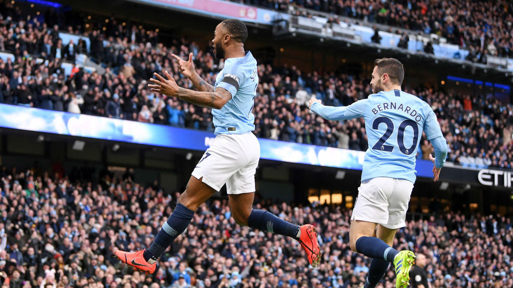 Raheem Sterling celebrates early lead for City.