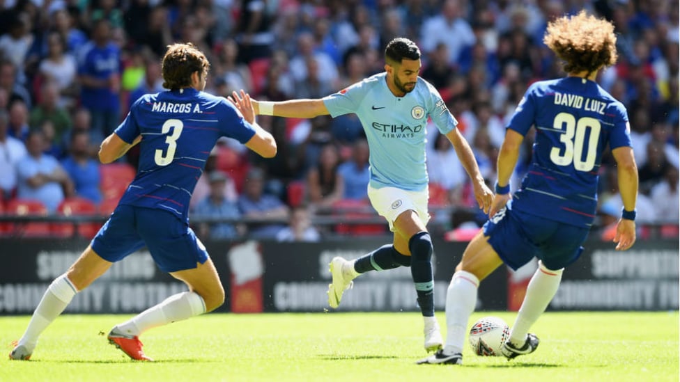 ACTION MAN : Riyad Mahrez looks to fire in a shot on the Chelsea goal