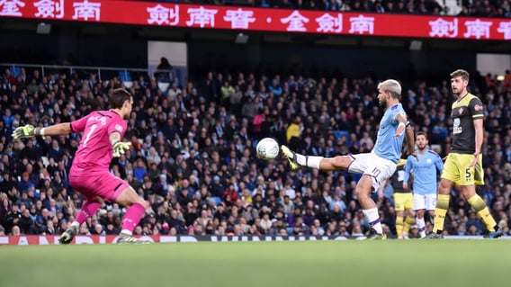 TOE POKE: Guiding home Riyad Mahrez' deflected cross for City's third.