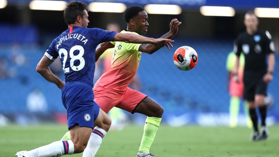 BUSY BOY : Sterling seeks to escape the attention of Chelsea's Azpilicueta early on.