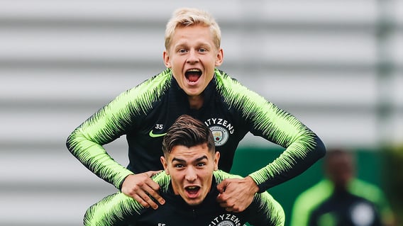 PIGGY BACK: Birthday boy Brahim Diaz gives Zinchenko a lift.