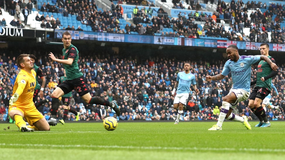 MAN ON FIRE : Raheem Sterling strikes a minute after the restart, firing into the near post