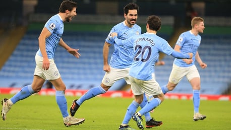 GUNDO-GOAL: Ilkay celebrates doubling the lead with a spectacular strike just before the hour mark.