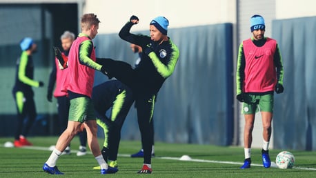 JUST FOR KICKS: Gabriel Jesus engages in some high jinks with Oleksandr Zinchenko