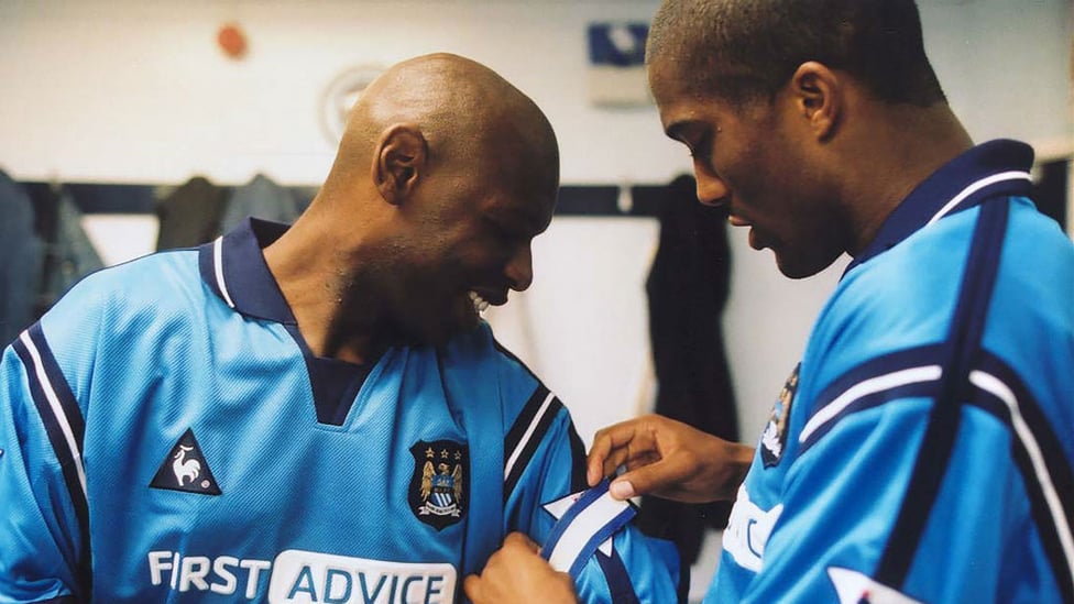 LEADING MAN: Sylvain Distin hands the captain's armband to Shaun Goater ahead of the final game