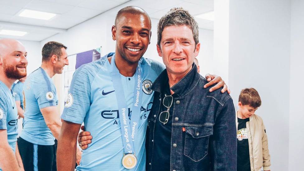 TUNES OF GLORY : Fernandinho and Noel Gallagher celebrate our 2019 Premier League success