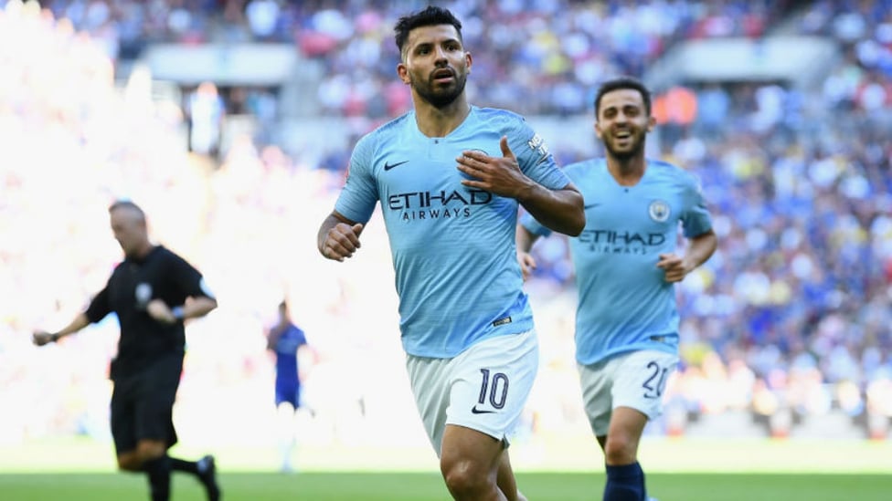 TWO GOOD : Sergio Aguero celebrates after doubling his personal tally and City's lead